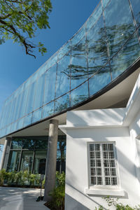 Low angle view of modern building against sky