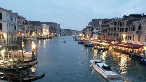 Boats moored in canal