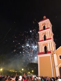 Low angle view of lit up at night