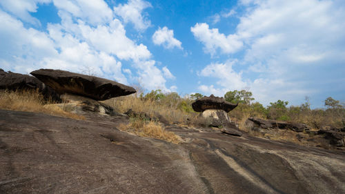 Panoramic shot of rocks on road against sky