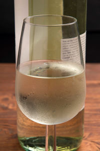 Close-up of beer glass on table