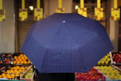 Close-up of umbrella in market