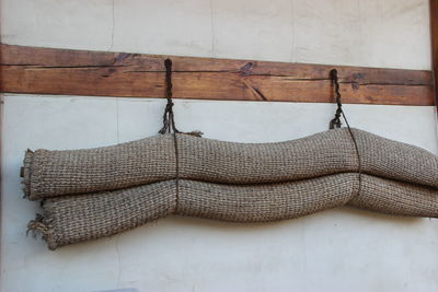 Close-up of clothes hanging on wall