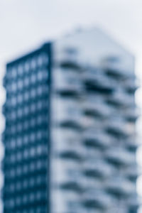 Close-up of metallic structure against sky