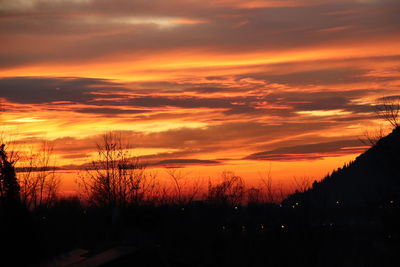 Scenic view of dramatic sky during sunset