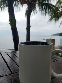 Close-up of coffee cup on table