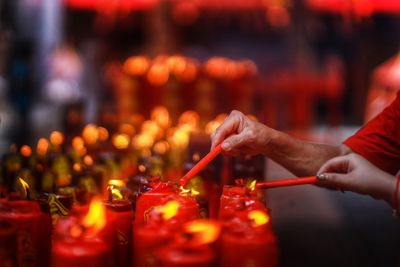 Cropped hand of person preparing food