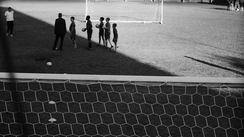 High angle view of people playing soccer