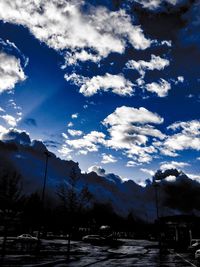 Scenic view of mountains against blue sky