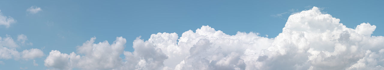 Low angle view of clouds against blue sky