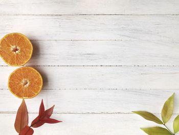 High angle view of orange fruits on table