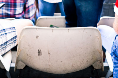 Low section of man sitting outdoors