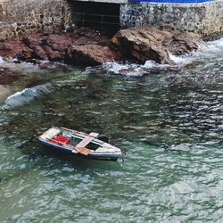 High angle view of boat sailing in river