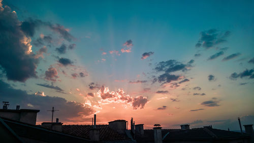 Panoramic view of city against sky during sunset