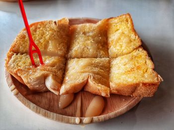 High angle view of bread in plate on table