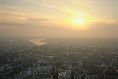 High angle view of buildings against sky during sunset