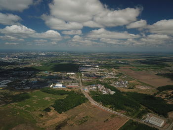 High angle view of buildings in city against sky