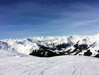 Winter snow covered mountain peaks in austrian alps. 