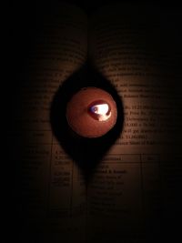 Close-up of heart shape on book