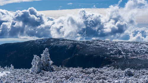 Scenic view of snowcapped mountain against sky