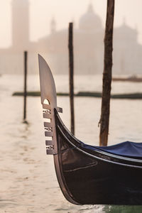 The iron prow-head of the gondola, called fero da prora or dolfin at sunrise