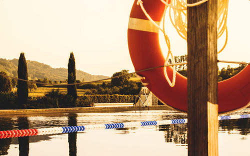 Life belt and rope against swimming pool