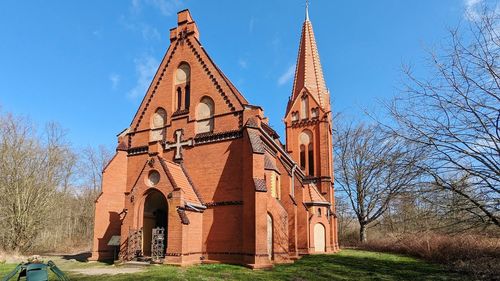 Low angle view of historic building against sky