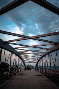 Footbridge against sky