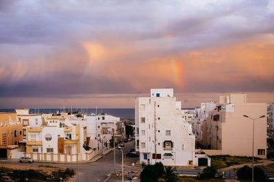 High angle view of buildings against sky during sunset