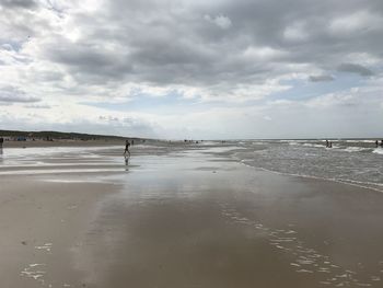 Scenic view of beach against sky