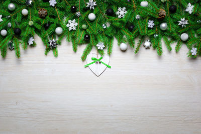 High angle view of christmas tree on wood