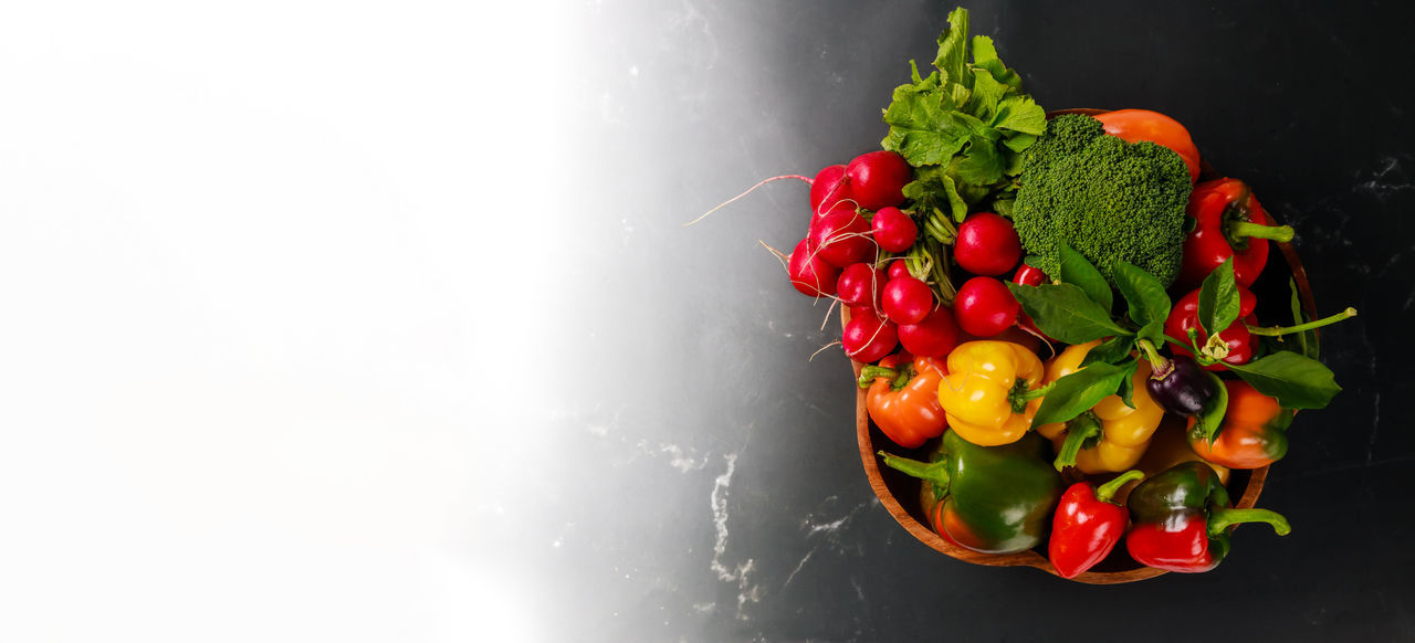 food and drink, food, healthy eating, wellbeing, freshness, vegetable, red, fruit, produce, plant, studio shot, indoors, copy space, organic, pepper, no people, flower, still life, ingredient, green, nature, tomato, berry, raw food, directly above, bell pepper, pepper - vegetable, macro photography, high angle view, leaf, close-up, variation