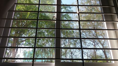 Low angle view of glass window