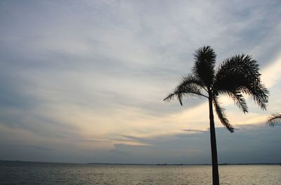 Scenic view of sea against sky at sunset