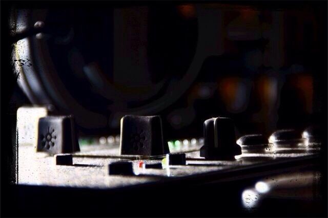 indoors, selective focus, still life, in a row, close-up, table, large group of objects, focus on foreground, order, no people, arrangement, repetition, auto post production filter, transfer print, group of objects, side by side, empty, metal, music, absence