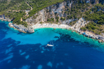 High angle view of sailboats in sea