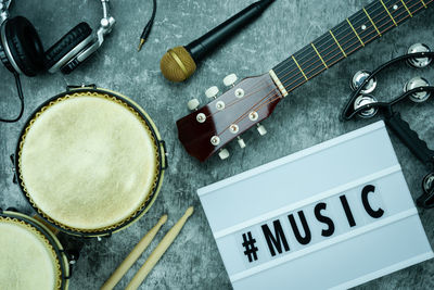 High angle view of guitar on table