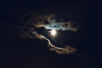 Low angle view of moon against sky at night