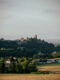 Buildings in city against sky