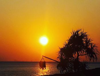 Scenic view of sea at sunset