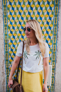 Young woman wearing sunglasses