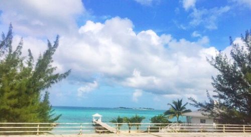 Scenic view of calm sea against cloudy sky