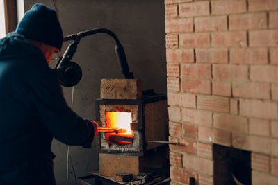 Man welding in workshop