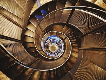 Directly above shot of spiral staircase in building