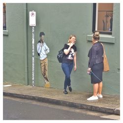 People standing on wall