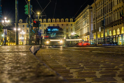 Illuminated street at night