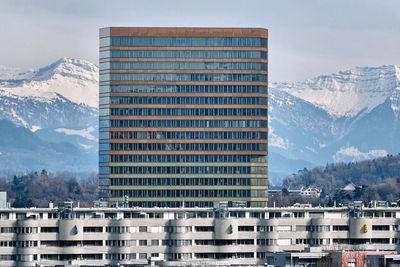 Buildings in city against sky