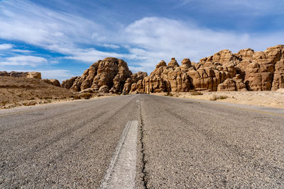 Road amidst rocks against sky wadi rum jordan