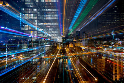 Light trails on illuminated city at night