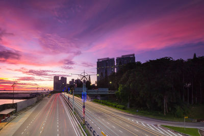 Light trails on road at dusk